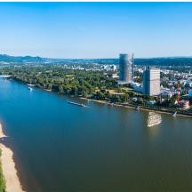 an aerial view of a river with a city
