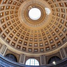 a ceiling of a building with a dome