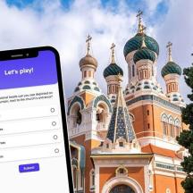 a phone in front of a church with a building