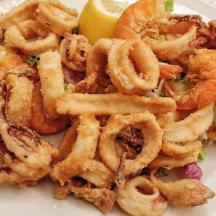 a plate of shrimp on a white plate