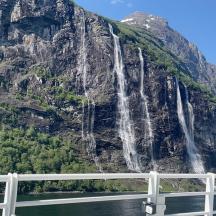 a mountain with waterfalls coming out of it