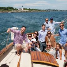 a group of people on a boat in the water