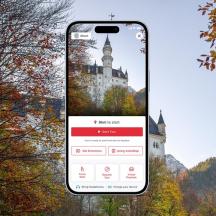 a cell phone with a picture of a castle