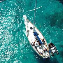 a boat floating in the water in the ocean