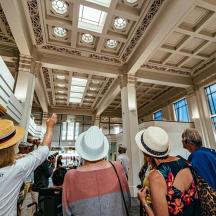 a group of people wearing hats in a building