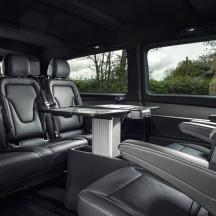 a table in the back seat of a van