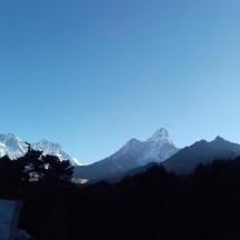a view of a mountain range with a blue sky