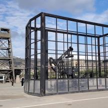 a large metal structure with a skateboard in it