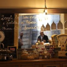 a shop with a counter with a window with a man