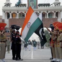 a group of people holding flags in a parade