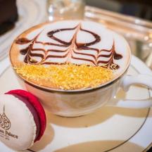 a cup of coffee on a plate on a table