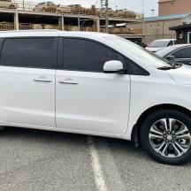 a white van parked in a parking lot