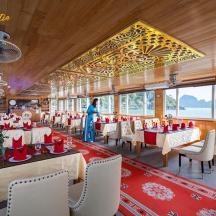 a dining car of a train with tables and chairs