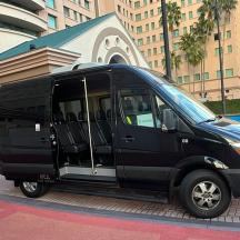 a black van parked in front of a building