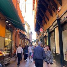 a group of people walking down a street
