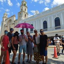 a group of people standing in front of a building