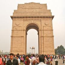 a crowd of people standing in front of a monument