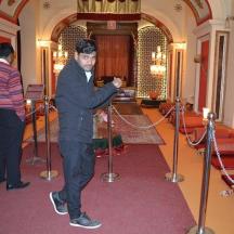 a man playing a video game in a room