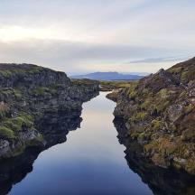 a river between two large rocky cliffs