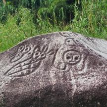 a rock with a face painted on it