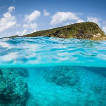 a view of an island from under the water