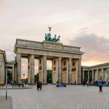 a large building with a statue in front of it
