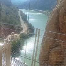 a view of a suspension bridge over a river