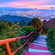 a set of stairs with a view of a city