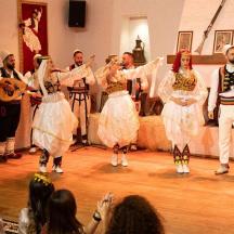a group of people dancing on a dance floor