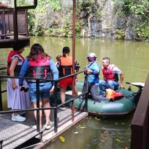 a group of people on a raft in the water