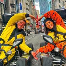 a group of people dressed in costumes sitting on motorcycles