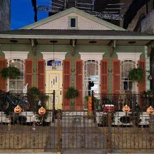 a house with pumpkins on the front of it