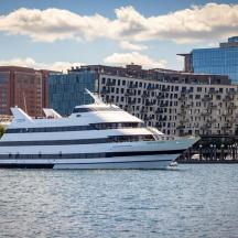 a large cruise ship in the water in a city