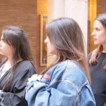 two girls are standing next to each other