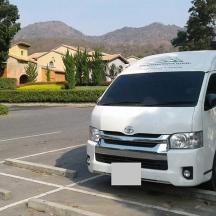 a white van parked in a parking lot