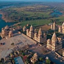 an aerial view of a large building in the water