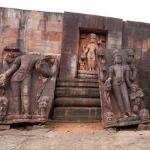 a building with statues on the side of it