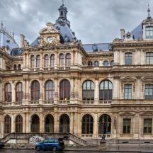 a large building with a clock on top of it