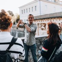 a man taking a picture of a group of people
