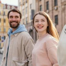 a man and a woman walking down a street