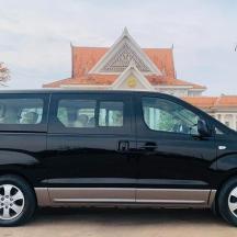 a black van parked in front of a building