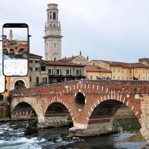 a cell phone taking a picture of a bridge