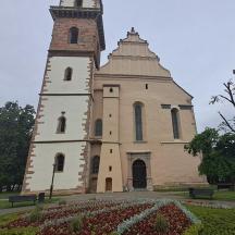 a church with a tower with a clock on it