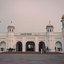 a large white building with domes on top of it