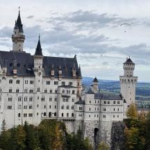 a large castle sitting on top of a mountain