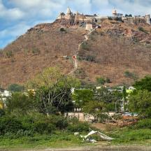 a hill with a castle on top of it