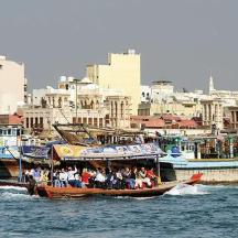a group of people on a boat in the water