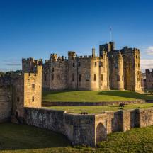 a castle in the middle of a field