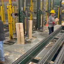two men in hard hats working on a construction site