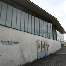a large building with windows on the side of it